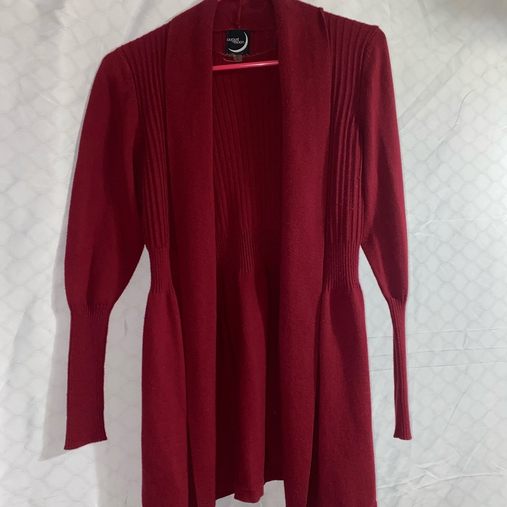 Red cardigan.